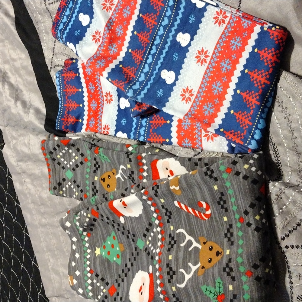 Two pairs of lined Christmas leggings women's size S